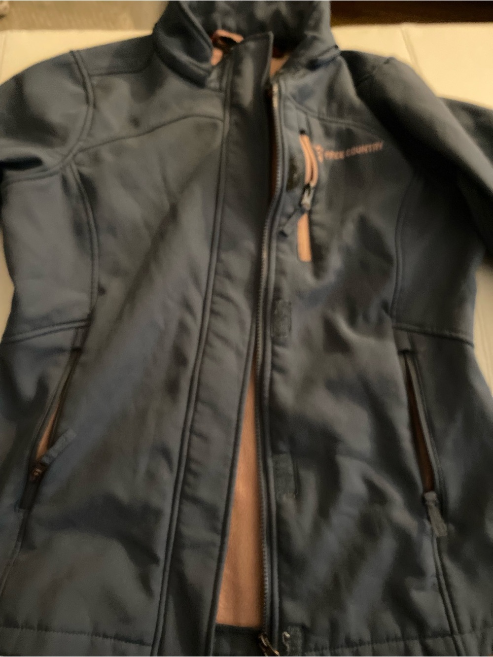 Free Country Navy Performance Softshell Jacket with peach color Accents